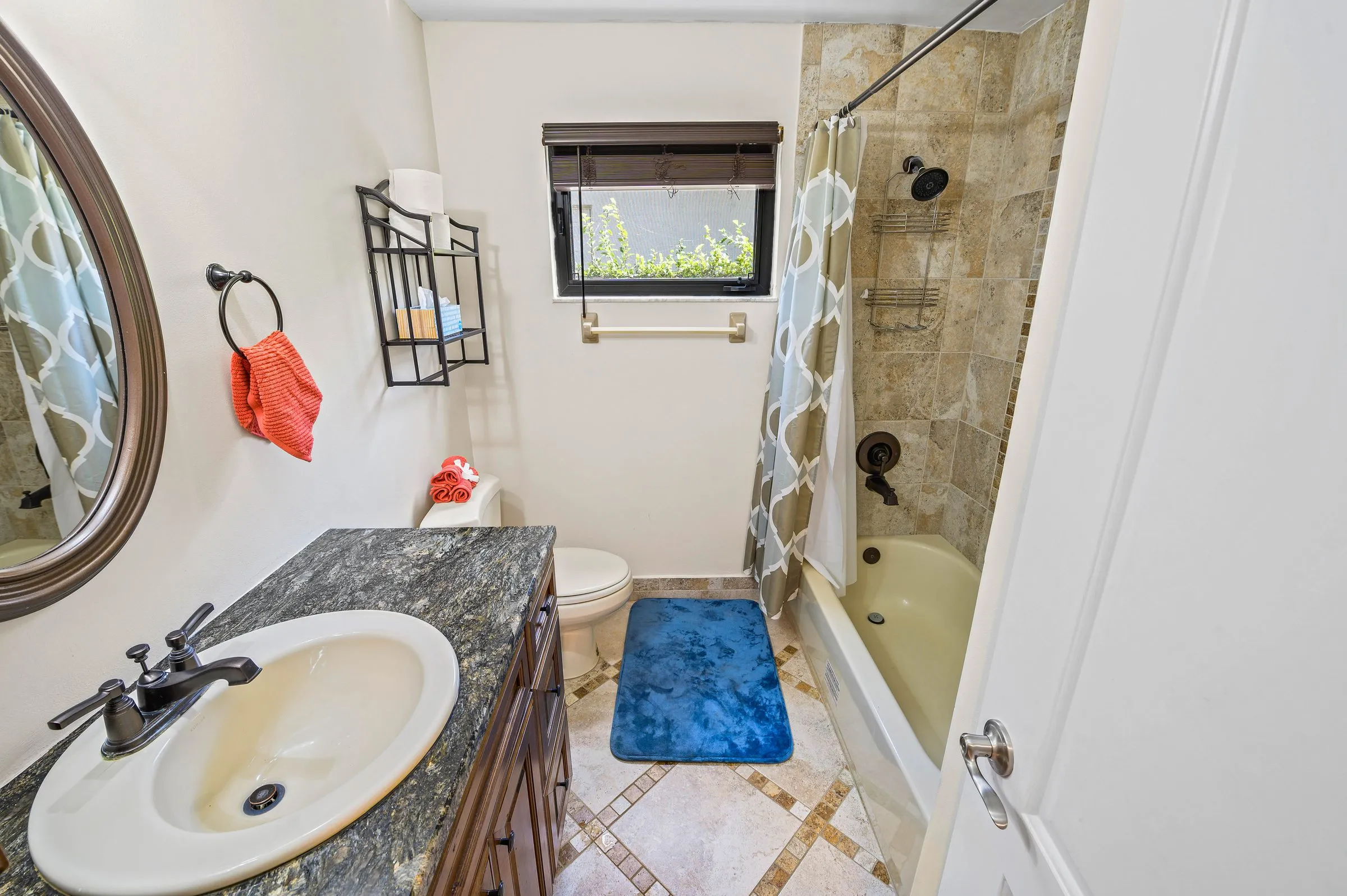 Shared bathroom with tub